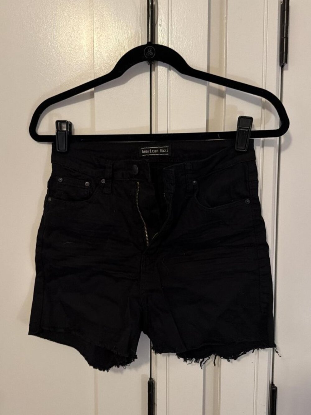 Black shorts with frayed hem